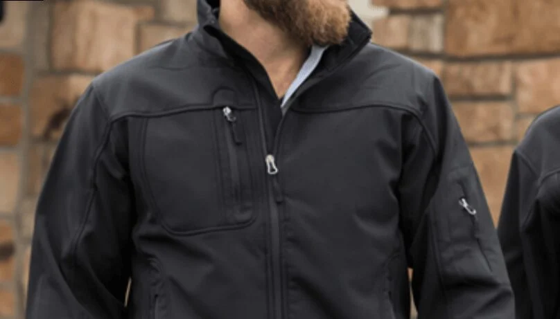 Softshell - What is it, what properties does it have - a person hiking in softshell jacket