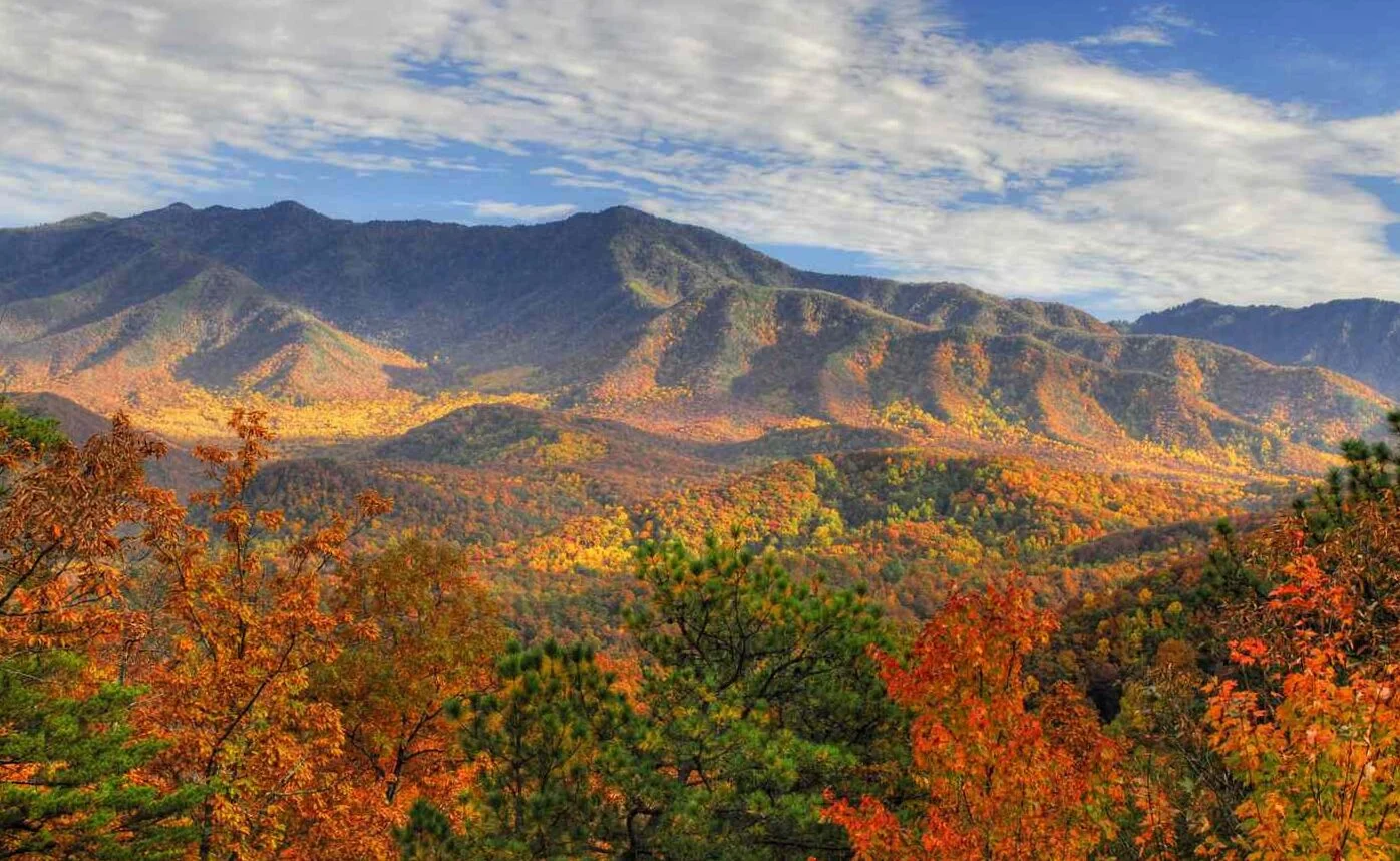 Autumn mountain hiking essentials: A backpack filled with gear